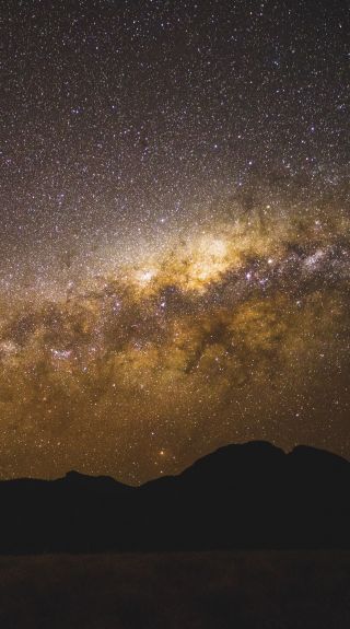 The starry Milky Way above the volcanic silhouette - Warrumbungles